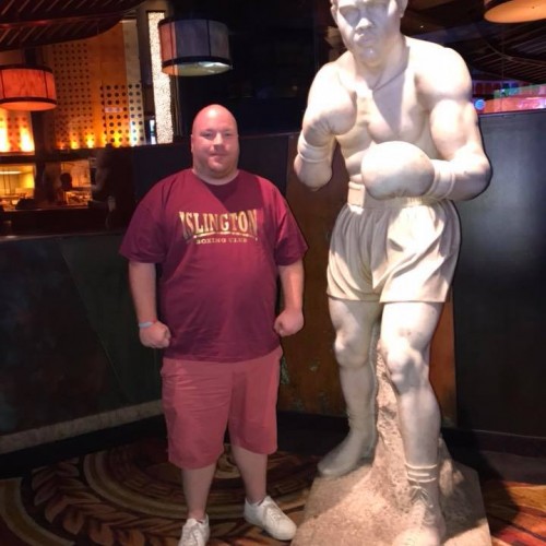 Reggie with Joe Louis Statue in Caesars Palace, Las Vegas